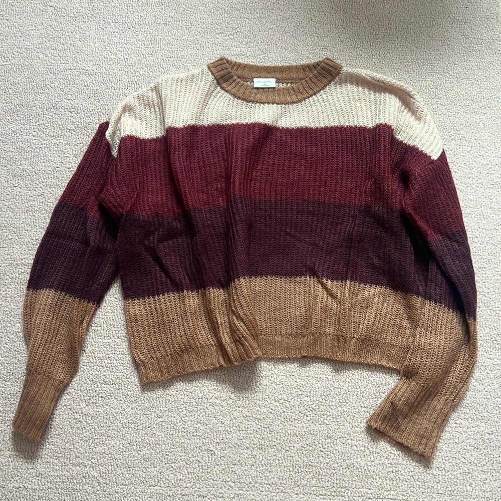 others follow striped sweater